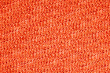 Fototapeta premium Orange red bright textile abstract background with diagonal stripes, fabric texture blank with copy space