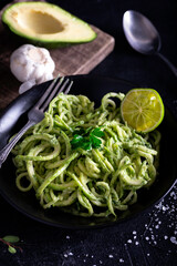 Zucchini raw vegan pasta with avocado dip sauce. Zucchini raw vegan pasta with avocado dip suace.