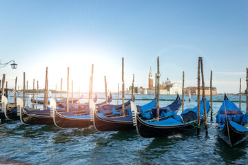 Fototapeta na wymiar Grand canal with gondolas in travel Europe Venice city, Italy. Old italian architecture with landmark bridge, romantic boat. Venezia.