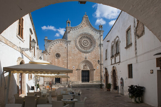 The Cathedral facade and Largo Arcivescovo Teodoro Trinchera in the "centro storico" (historic centre) of Ostuni, Apulia, Southern Italy