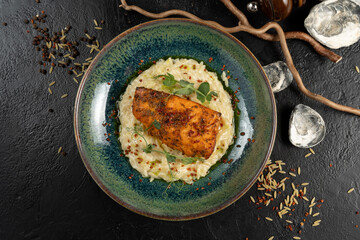 Salmon with orzo pasta. A hot main course of sea fish and pasta.