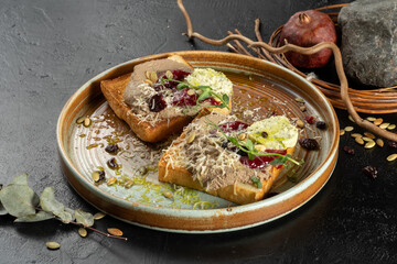 Chicken liver pate. Pate with toast and green butter. Cold appetizer.
