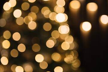 christmas lights in blur, bokeh on a dark background, copy space