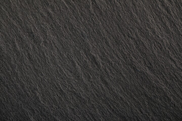 Fototapeta premium Black stone background. Dark gray banner with concrete wall surface texture.