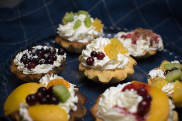 dessert with cream and fruit in tartlets