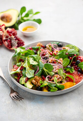 Orange-grapefruit salad with pomegranate seeds