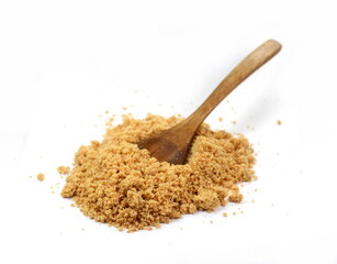 Peanut Butter Powder  in a Wooden Spoon on a White Background. Ground peanuts.