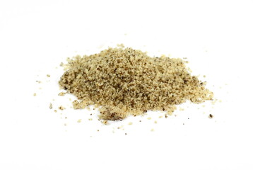 Ground walnuts powder on white. Chopped walnuts pile isolated on white background