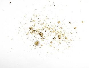 Ground walnuts powder on white. Chopped walnuts pile isolated on white background