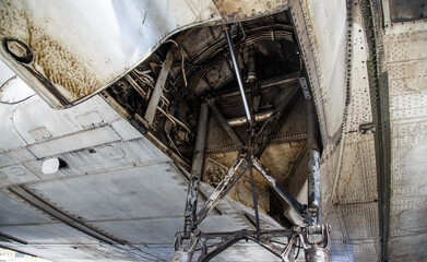 close-up details of aircraft 50s, aluminum skin, landing gear and wing close-up.