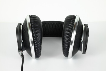 Modern studio headphones on the white background