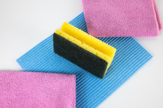 Kitchen sponge, blue dishcloth and rose micro fiber cloth
