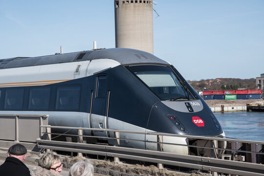 A DSB IC4 train passing the Masnedsund bridge in Denmark