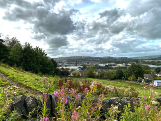 Landscape view, on a cloudy day, of the former industrial heartland in, Keighley, Yorkshire, UK - obrazy, fototapety, plakaty
