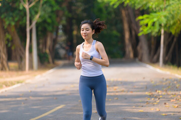 Young woman running in a park