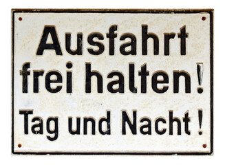 German sign isolated over white. Exit, keep clear day and night
