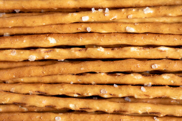 Salzstange salt pretzel sticks food background 