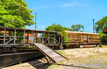 Fototapeta na wymiar Rusty railway cars in a depot in Asuncion, Paraguay
