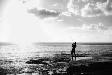 Man fishing by the sea, Honolulu, Oahu, Hawaii