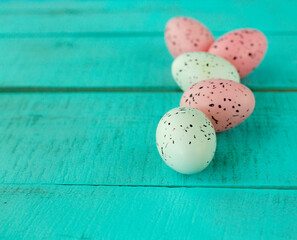 bright easter eggs on a blue plain surface, easter decor