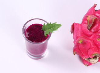 fresh dragon fruit juice or fresh dragon fruits smoothies isolated white background