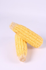 fresh corn on the table isolated white background
