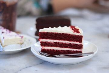 Red Velvet Cake Put on a white plate in the cafe.