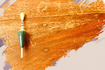 Fishing accessories on wooden plate © Elmar Kriegner