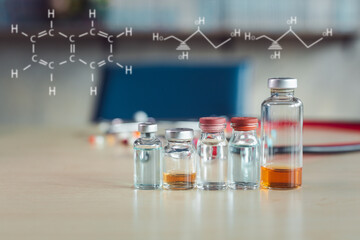 dotor hand holding red stethoscope