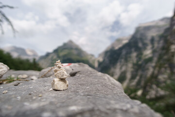 Cairn as waymarker on rock in alps triglav nationalpark
