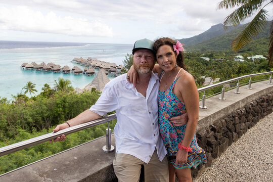 Happy Couple On Tropical Vacation On The Island Of Moorea In French Polynesia