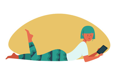 Girl with bright hair lying on the floor with a tab