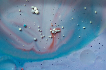 Painted Galaxy Art Created in Oil and Milk. Galaxies evolve in this artistic science experiment....