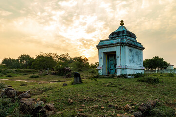 A temple is a building reserved for religious or spiritual rituals and activities such as prayer and sacrifice. The old hindu temple in a green positively energetic area.