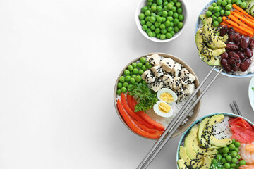 Different poke bowls on light background