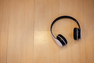 headphones on a wood background