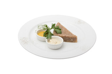 Restaurant service concept. National cuisine. Russian traditional dish - Holodets. Homemade jellied meat with garlic and spices garnished with mustard and spring onion. Isolated.