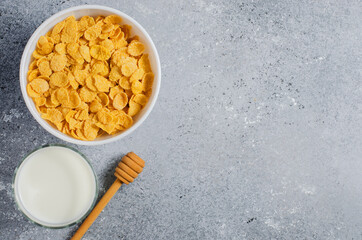 Corn flakes and milk. Healthy diet. Flat top view. Copy space