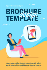 Young guy sitting in chair and chatting with girl