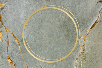 Golden framed circle on a marble texture