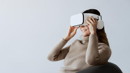 Woman experiencing VR simulation entertainment technology