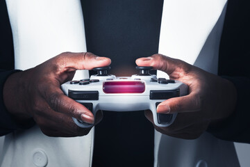 Hands holding video game controller - obrazy, fototapety, plakaty