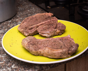 A plate of cooked steak