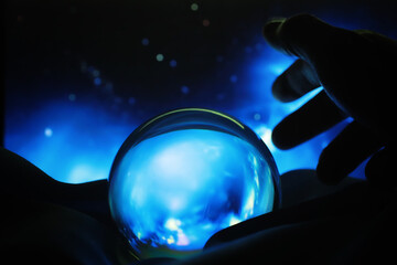 Fototapeta na wymiar Astrological background. Crystal ball with predictions. Horoscope of the stars. Fortune telling and determination of fate. Soothsayer with a crystal ball.