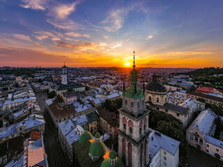 Obraz premium Aerial view on Dominican Church and Dormition Church in Lviv, Ukraine from drone