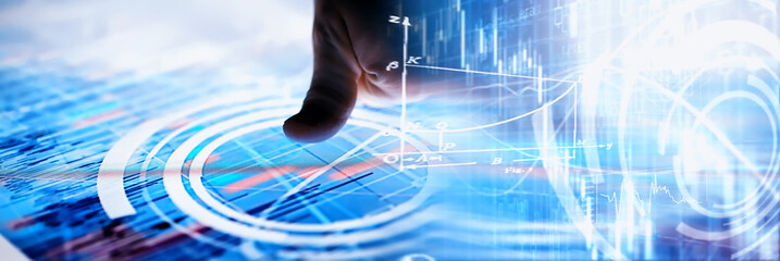 Business concept. Information technology and data processing. Hands over the screen with graphic data. A modern software product in business.