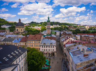 Fototapeta premium Aerial view on Market square, Dormition, Dominican and Carmelite Church in Lviv, Ukraine from drone