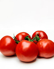 Tomatoes surrounded by white background