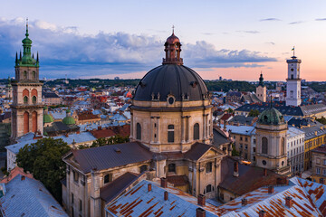 Obraz premium Aerial view on Dominican Church and Dormition Church in Lviv, Ukraine from drone