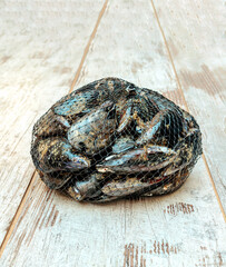 Mussels surrounded by rustic background
